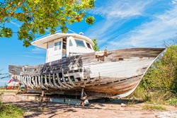 Abandoned old wooden fishing boat near Fazana, a small town on the Istrian peninsula in Croatia.