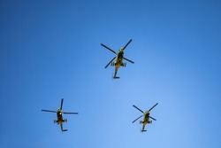 Three Helicopters Flying in Formation - Army airforce group - Military Aircraft