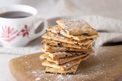 Biscuits with raisins, sprinkled with powdered sugar