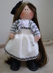 Cloth doll with dress and long blond hair