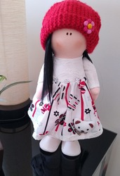 Rag doll with clothes and long hair
