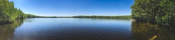 background photo panorama, view of a beautiful forest lake designed for fishing, in the midst of lush greenery, in the territory of a natural national park, in Mari El, Russia