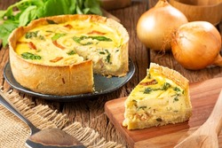 Spinach quiche with onion and bacon.