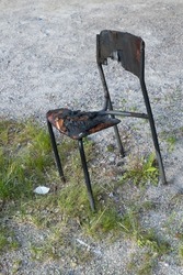 Old burned office chair, Finland