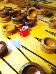 Backgammon, other common names: trick-track, backgammon, tavla, shesh-besh, kosha - a board game for two players on a special board divided into two halves.
