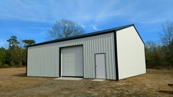 Post frame storage shed perfect for lawnmowers, trailers, ATV's, vehicles, boats, any recreational activities