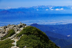 superb view of northern alps from the summit of Mt.Shiomi in the Southern Alps,ina city,nagano prefecture,japan.