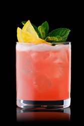 Variation of whiskey sour cocktail with grapefruit syrup isolated on black background