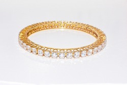 beautiful golden bracelet gemstone gold platinum with diamond bangle isolated on white background