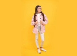 looking cool. latest trend. autumn fashion. happy teen girl in pink checkered shirt. smiling hipster kid casual style. tween child wear plaid shirt. chequered flannel jacket. beauty and fashion.
