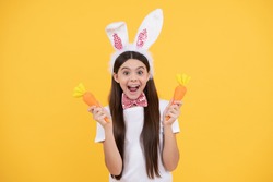 what a surprise. bunny hunt. just having fun. ready for party. happy childhood. cheerful bunny kid with carrot. happy easter holiday. funny child in rabbit ears. smiling teenager girl in bow tie.