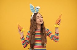 I want to eat. happy teen girl wear bunny ears. happy easter. childhood happiness.