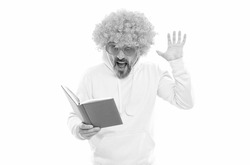 Literary fan. Surprised nerd in wig read book. Examination in literary English
