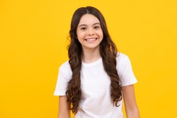 Little kid girl 12,13, 14 years old on isolated background. Children studio portrait. Emotional kids face. Happy teenager, positive and smiling emotions of teen girl.
