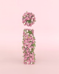 Creative letter I concept made of fresh Spring wedding flowers. Flower font concept on pastel pink background.