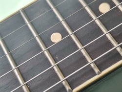 guitar frets and strings texture in macro for background