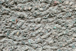 Grey rock or cement wall. Abstract wallpaper pattern. Rough surface of decoration background. Vintage stonewall.
