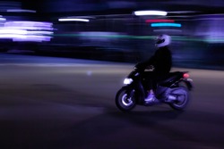 Barcelona biker driving in the night