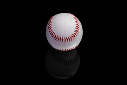 Baseball ball on a black background.