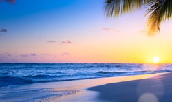Art Beautiful sunset over the tropical beach