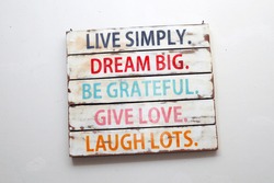 Live Simply, Dream Big, Be Grateful, Give Love, Laugh Lots. Motivational words
