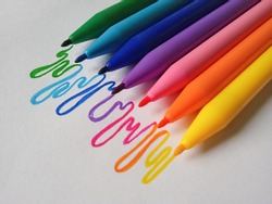 Assorted Color Markers With Droplets Drawing Of Each Marker Color