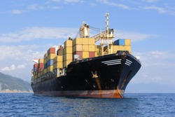 Large container ship in mediterranean coast