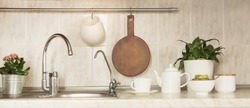 Kitchen concept. Cooking healthy breakfast, cup of black coffee and granola. Close up