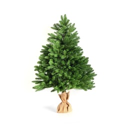 Artificial Christmas tree without decor on stand wrapped in burlap isolated on white background. Xmas holiday. Reusable cast Christmas tree.