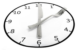 A clock with cutlery hands. Arrows in the form of a knife and fork. Lunch time.
