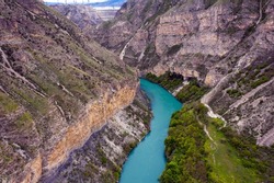 Sulak Canyon. Dagestan. River, mountains, turquoise water. Shot from a drone. Russia, Republic of Dagestan. Boat trip