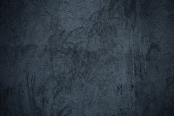 Abstract grunge black Background, Texture. Gloomy dirty old empty concrete wall. Textured rough dark grey Surface. Vintage Web banner or Wallpaper With Copy Space