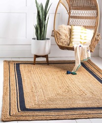 Modern natural braided jute living area rug design