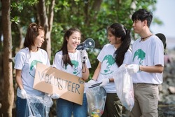 Group of Asian diverse people volunteer holding a speech sign for World Environment Day campaign,Earth Day about pollution,ecosystem,energy and garbage.