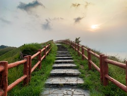 Gradually blurred hillside staircase along with warm sunset in August at Tai O, Hong Kong