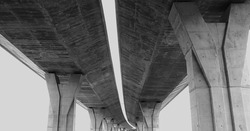 Bridge, black and white photography, bridge photographed from below, lower part, concrete pillars, angle of view, visualization of endless, construction bridge structure  building