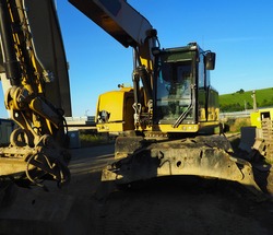 Excavator in working environment, construction, construction car, car with hydraulics, yellow excavator, construction industry, clay