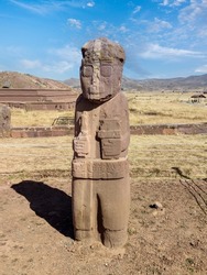 Monolith Fraile, an ancient artifact carved in sandstone grain of 3 metres of height, in Tiwanaku or Tiahuanaco pre-columbian Archaeological site, in Bolivia, South America. 