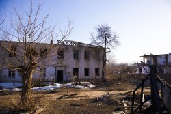 an old abandoned house under demolition. the destroyed house  