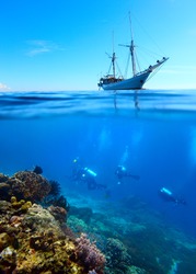 Collage of scuba divers exploring a coral reef and anchored sail boat on a surface