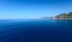 Calm Mediterranean sea and coast of Italian's Cinque Terre National Park
