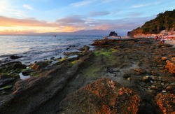 Tropical island of Apo at sunset. Philippines