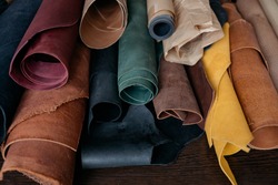 Different colors of  leather for handmade bags and wallets. Leather studio.