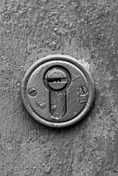 black and white photo of a keyhole. Old keyhole closeup