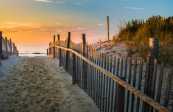 Sunrise glows at the Atlantic seashore at Marine St. in Beach Haven, New Jersey
