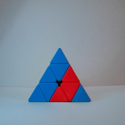 Colourful Pyraminx Cube, Puzzle Box Shap In white Background