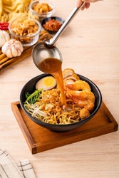 Hokkien mee or Prawn noodle are tossed in pork lard and served with fish balls, shrimp.

Hokkien mee is a Southeast Asian dish that has its origins in the cuisine of China's Fujian (Hokkien) province