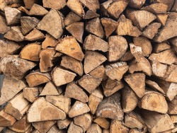 Stacked firewood for camp fires and fireplaces.