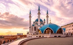 Kazan Kremlin in summer, Tatarstan, Russia. Beautiful view of Kul Sharif mosque, landmark of Kazan. Modern architecture, tourist attraction in Kazan city center at sunset. Islam and travel concept.