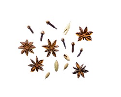 Top view set of cardamom, star anise, coriander, cloves, isolated on white background. Spices, ingredients for preparation mulled wine, Masala tea, winter concept